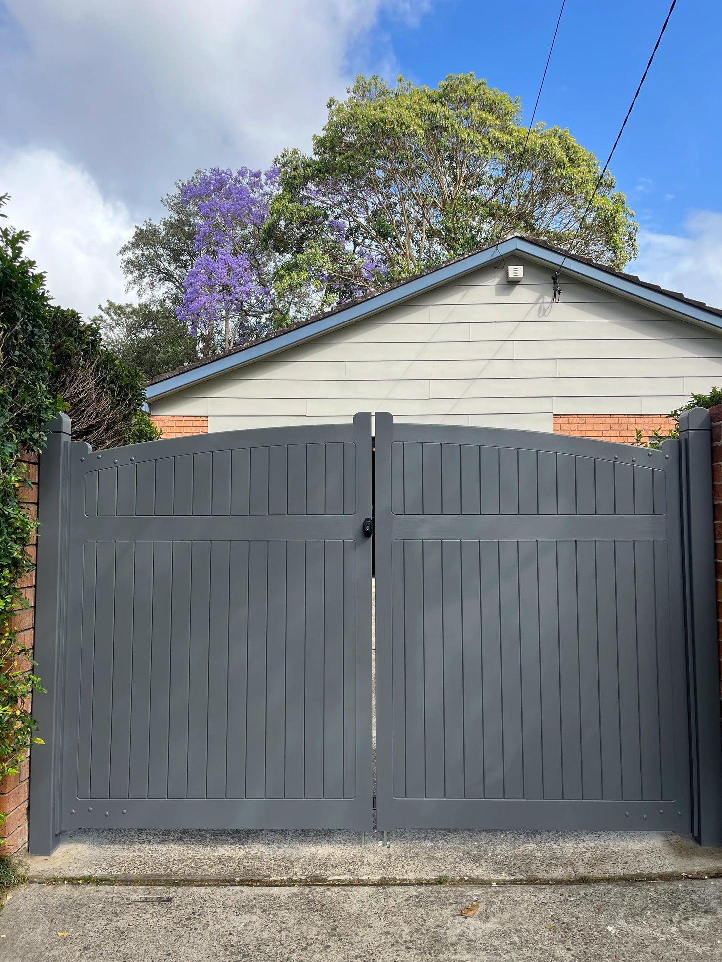 Hampton Classic solid driveway gate with privacy window, primed T&G face