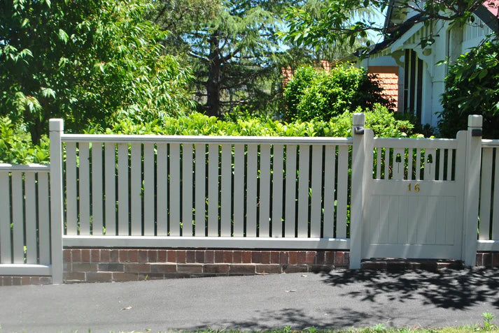 Curved classic timber gate in a balustrade run