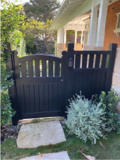 Hampton New Generation Mk A pedestrian gate with picket-top window and solid lower panel, primed