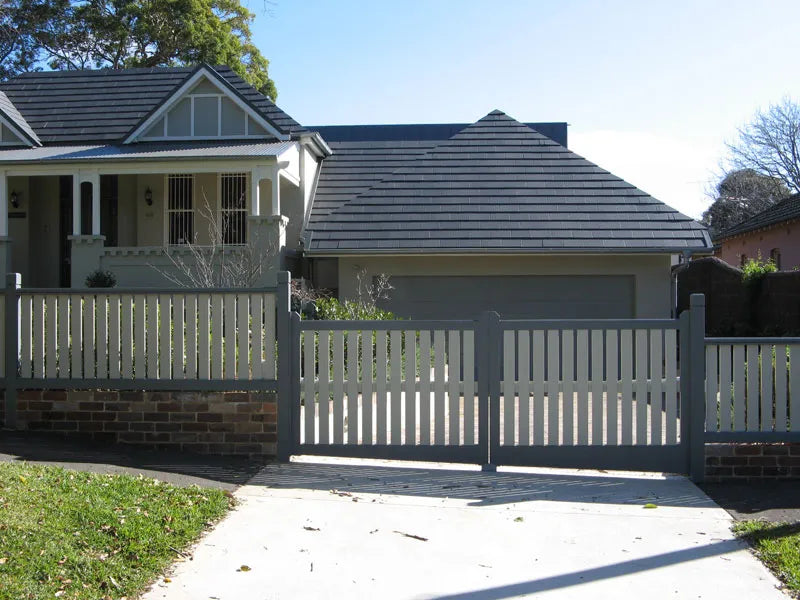 Balustrade timber driveway gate with full height fine pickets