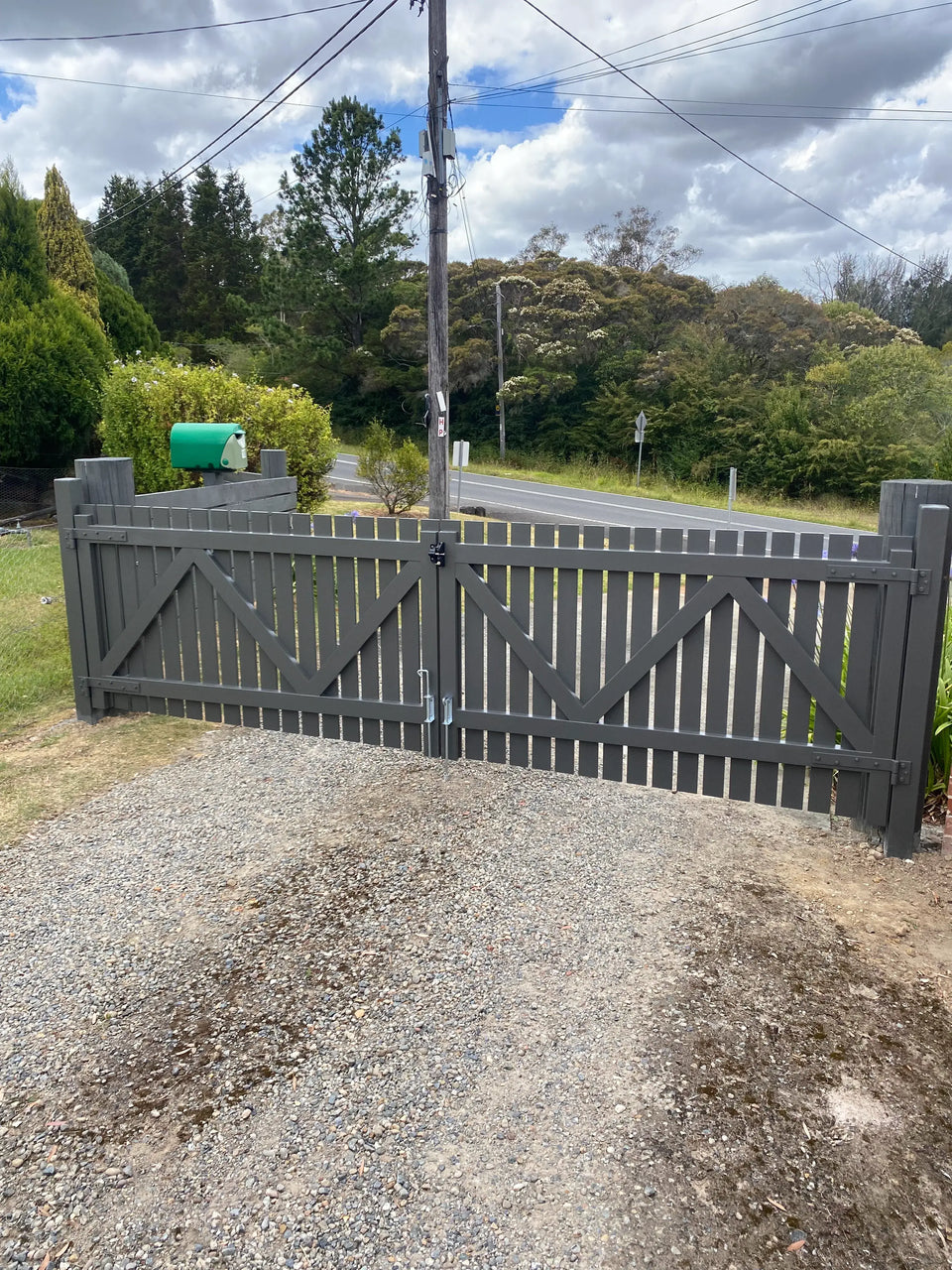 Open timber picket driveway gate pair, primed
