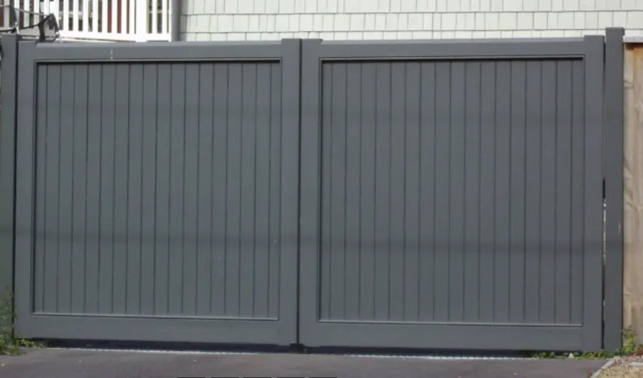 Solid timber driveway gate pair, fully private flush face